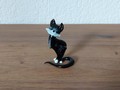 Kleine Katze aus schwarzem Glas