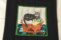 Topflappen Katze in der Wäschezeine I