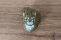 Stein Katze mit blauen Augen