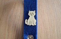 Blauer Schlüsselanhänger mit gelber Katze