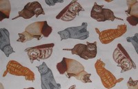 Schöner Stoff mit sitzenden Katzen